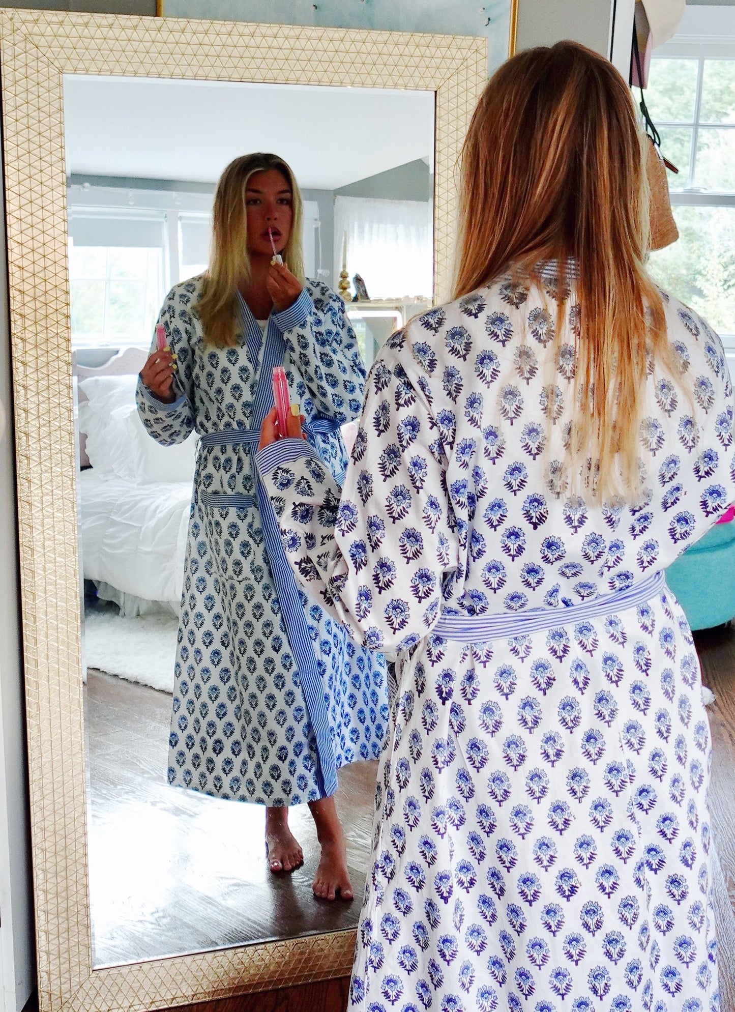 Blue and white flowered robe with light blue map on pocket