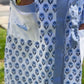 Blue and white flowered robe with light blue map on pocket