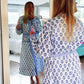Blue and white flowered robe with light blue map on pocket