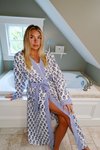 Blue and white flowered robe with light blue map on pocket