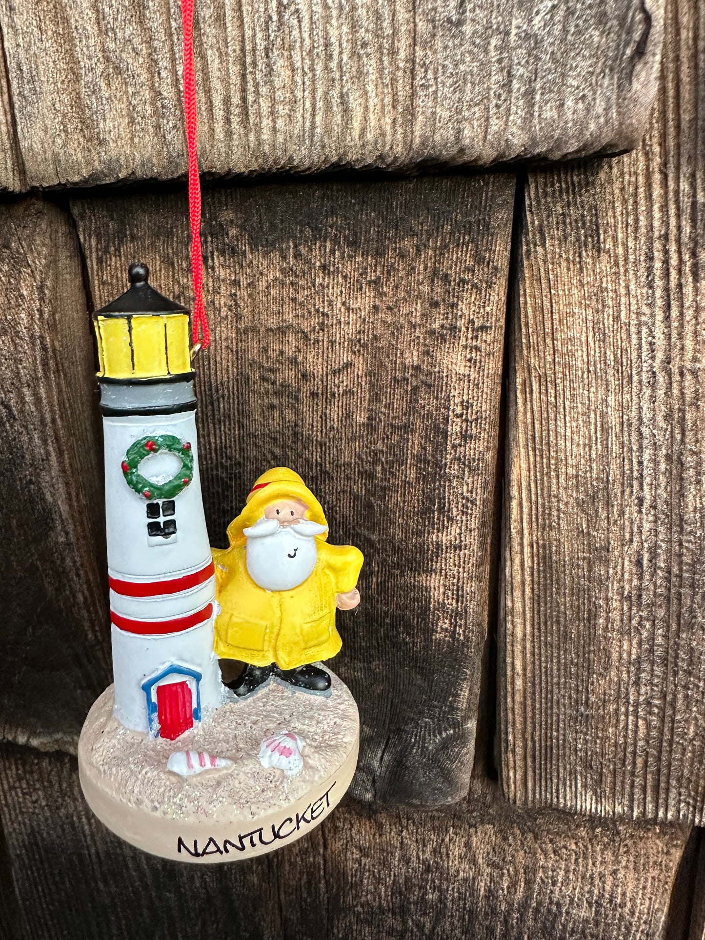 SANTA WITH LIGHTHOUSE ORNAMENT